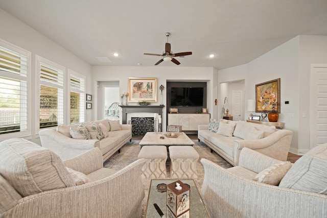 13305 Newcastle Creek Ct, Houston, TX 77059 - living area with ceiling fan, recessed lighting, wood finished floors, and a fireplace
