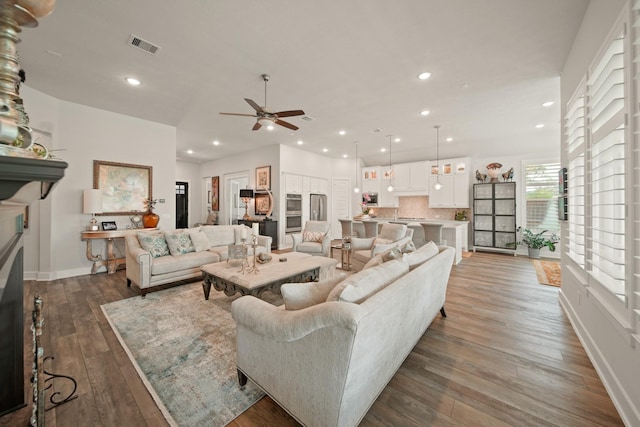 13305 Newcastle Creek Ct, Houston, TX 77059 - living area featuring a ceiling fan, hardwood / wood-style floors, and recessed lighting