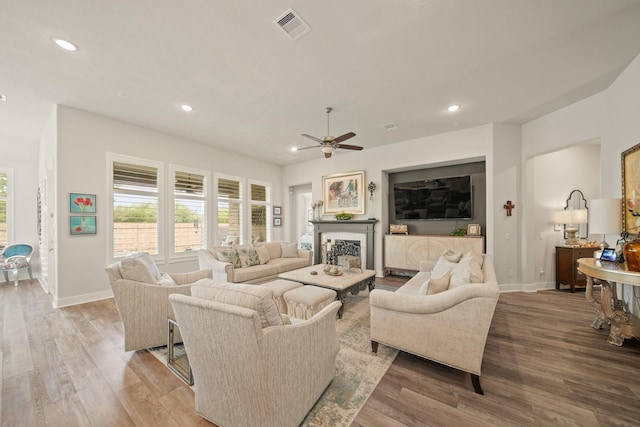 13305 Newcastle Creek Ct, Houston, TX 77059 - living room with a ceiling fan, recessed lighting, wood finished floors, and a fireplace