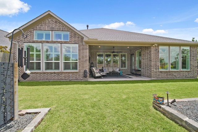 13305 Newcastle Creek Ct, Houston, TX 77059 - back of property with brick siding, ceiling fan, a patio, and a yard