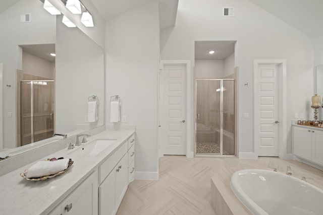 13305 Newcastle Creek Ct, Houston, TX 77059 - bathroom with vanity, a stall shower, a bath, and high vaulted ceiling