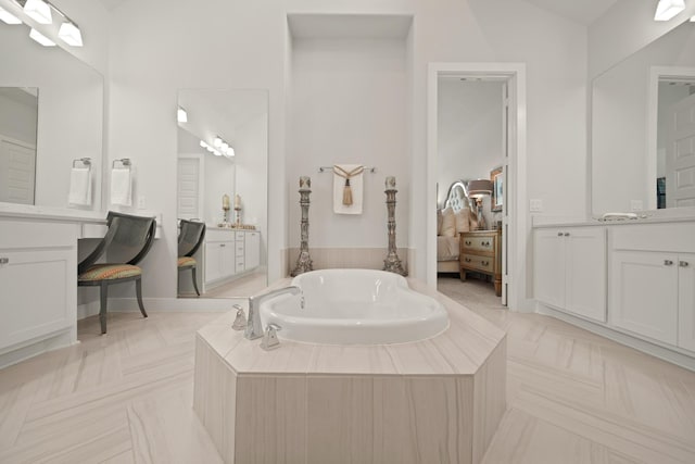 13305 Newcastle Creek Ct, Houston, TX 77059 - ensuite bathroom with a garden tub and two vanities