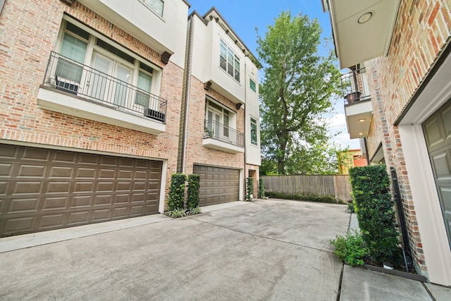 1034 W 26th St Unit D, Houston, TX 77008 - patio / terrace with driveway and a garage