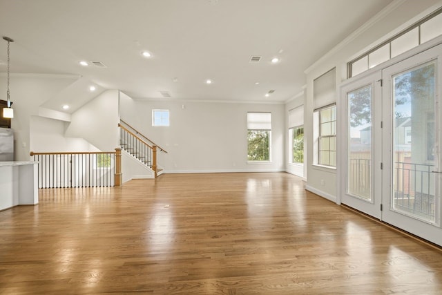 1034 W 26th St Unit D, Houston, TX 77008 - empty room featuring recessed lighting, crown molding, light wood-style floors, and stairway