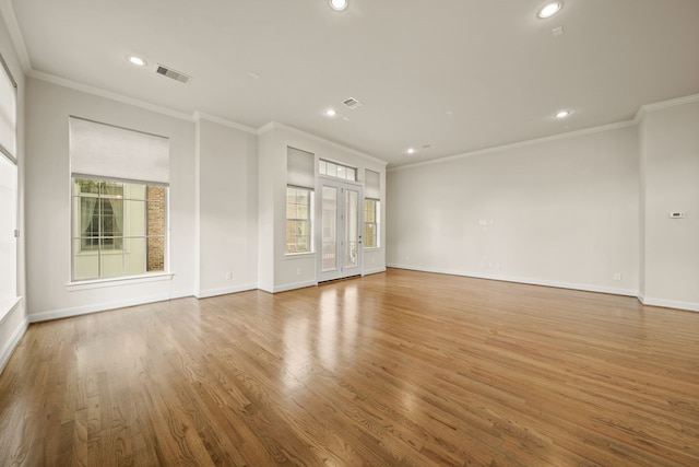 1034 W 26th St Unit D, Houston, TX 77008 - spare room with recessed lighting, wood finished floors, and crown molding
