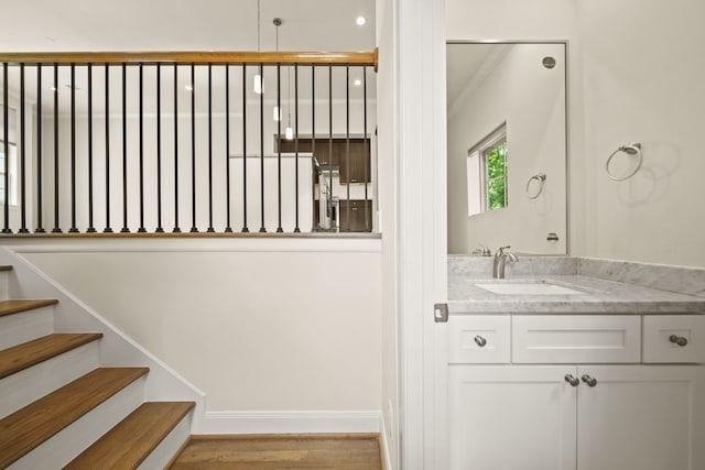 1034 W 26th St Unit D, Houston, TX 77008 - stairway with wood finished floors and crown molding