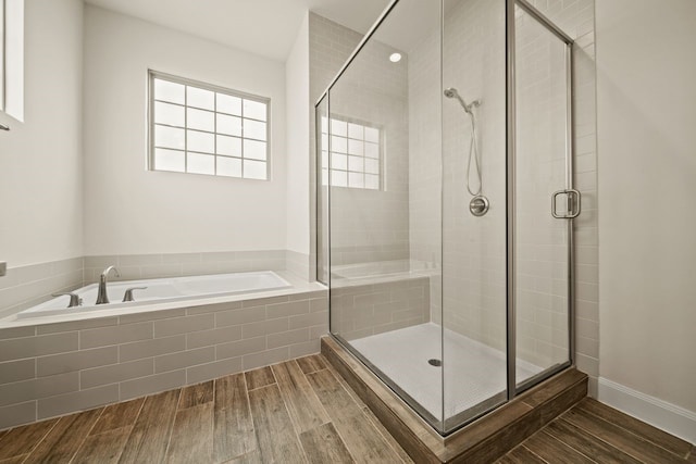 1034 W 26th St Unit D, Houston, TX 77008 - full bath with a garden tub, wood finished floors, and a shower stall