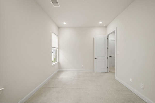 1034 W 26th St Unit D, Houston, TX 77008 - unfurnished room featuring recessed lighting and light colored carpet