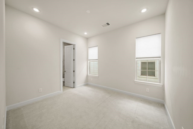 1034 W 26th St Unit D, Houston, TX 77008 - spare room featuring light carpet and recessed lighting