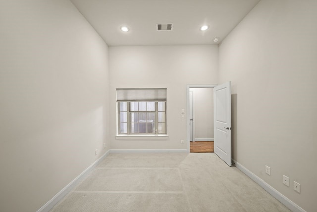 1034 W 26th St Unit D, Houston, TX 77008 - empty room with carpet floors and recessed lighting