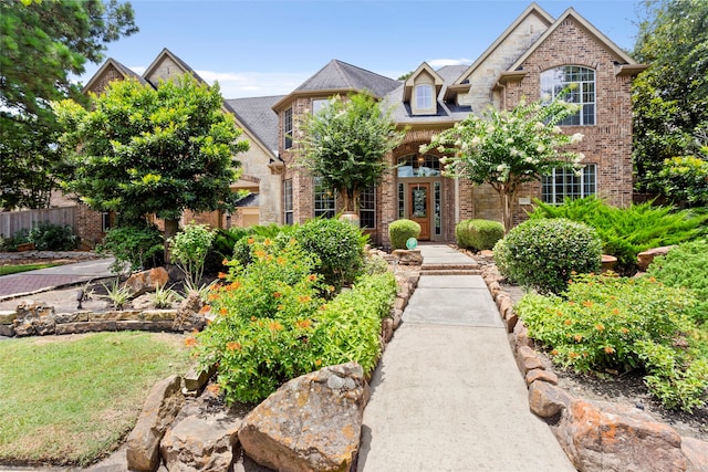 12902 Tamarack Bend Ln, Humble, TX 77346 - view of front of home featuring brick siding