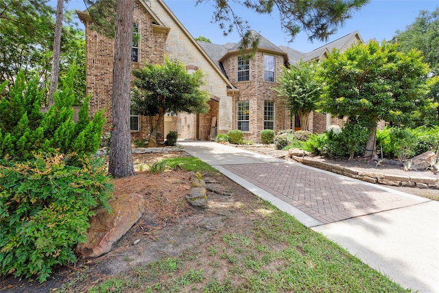 12902 Tamarack Bend Ln, Humble, TX 77346 - view of front facade with brick siding and stone siding