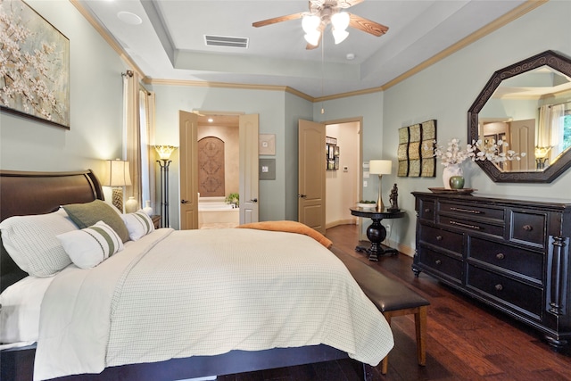 12902 Tamarack Bend Ln, Humble, TX 77346 - bedroom with wood finished floors, a raised ceiling, ornamental molding, and a ceiling fan