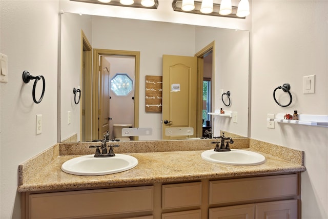 12902 Tamarack Bend Ln, Humble, TX 77346 - bathroom featuring double vanity and healthy amount of natural light