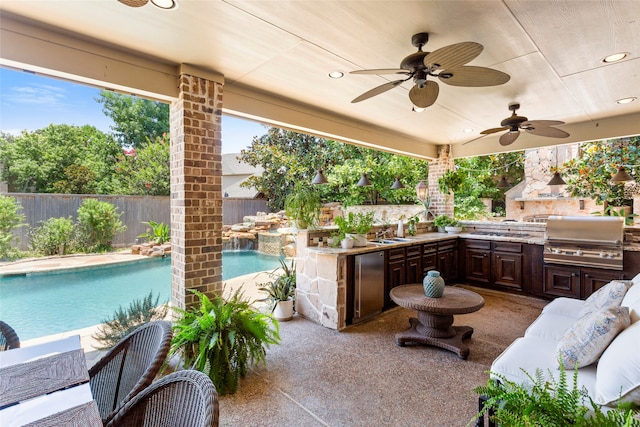12902 Tamarack Bend Ln, Humble, TX 77346 - fenced backyard with area for grilling, a patio, a ceiling fan, and an outdoor living space
