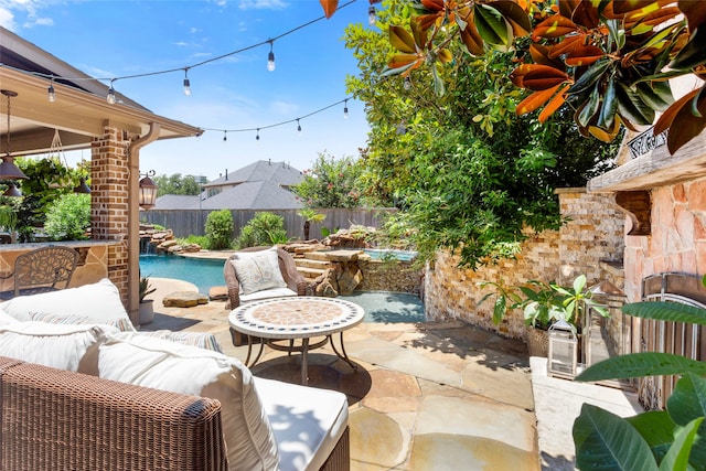 12902 Tamarack Bend Ln, Humble, TX 77346 - fenced backyard featuring a patio and outdoor lounge area