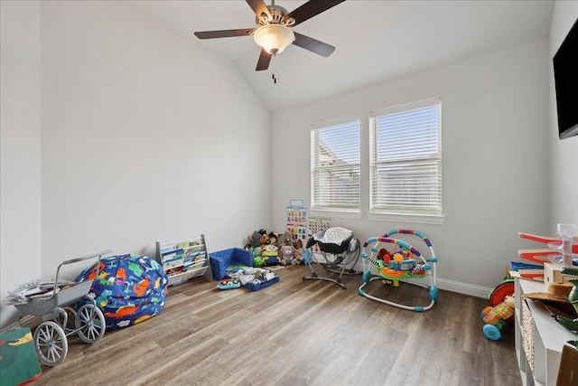 9111 Regan Way, Mont Belvieu, TX 77523 - recreation room featuring wood finished floors, lofted ceiling, and a ceiling fan