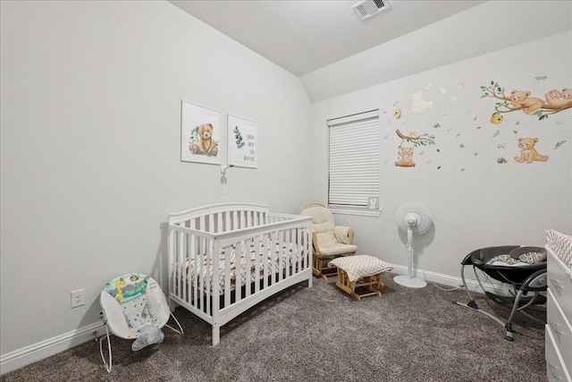 9111 Regan Way, Mont Belvieu, TX 77523 - carpeted bedroom featuring vaulted ceiling and a nursery area