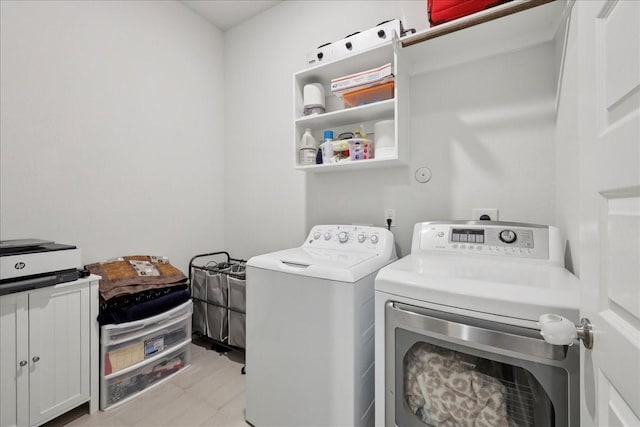 9111 Regan Way, Mont Belvieu, TX 77523 - washroom featuring washing machine and clothes dryer