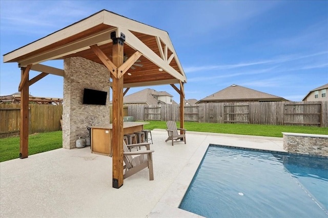 9111 Regan Way, Mont Belvieu, TX 77523 - view of pool with a patio area, a fenced backyard, and a gazebo