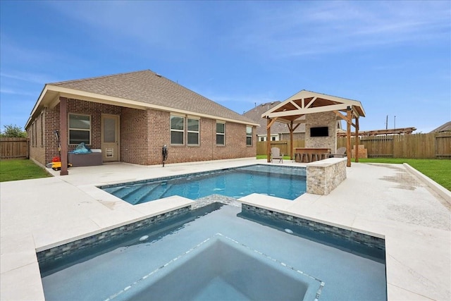 9111 Regan Way, Mont Belvieu, TX 77523 - view of pool with a patio area, a fenced backyard, a gazebo, and a pool with connected hot tub