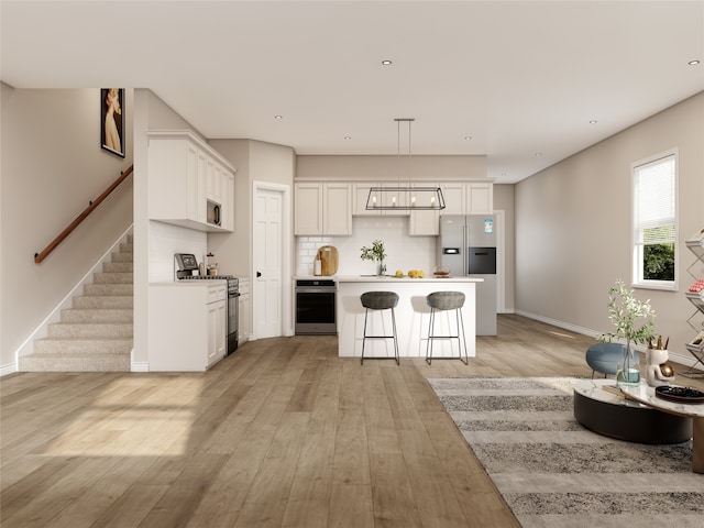 8832 Curry Rd, Houston, TX 77093 - kitchen with stainless steel appliances, a kitchen island, light wood-type flooring, backsplash, and a kitchen breakfast bar