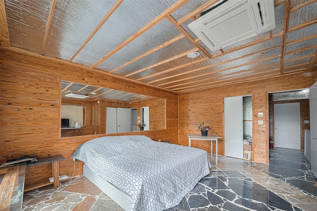 5 Briar Dale Ct, Houston, TX 77027 - bedroom with wood walls and stone floors