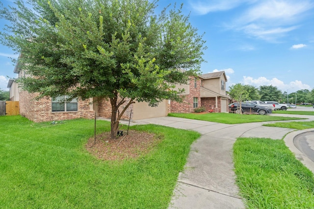2043 Harmon Park Ct, Spring, TX 77373 - obstructed view of property featuring brick siding and concrete driveway