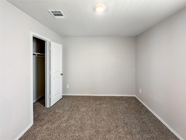 14047 Thunder Pines Dr, Conroe, TX 77302 - unfurnished bedroom with carpet flooring and a closet