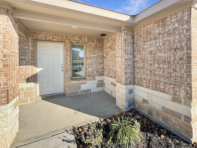 14127 Carly Pines Ct, Conroe, TX 77302 - doorway to property featuring brick siding