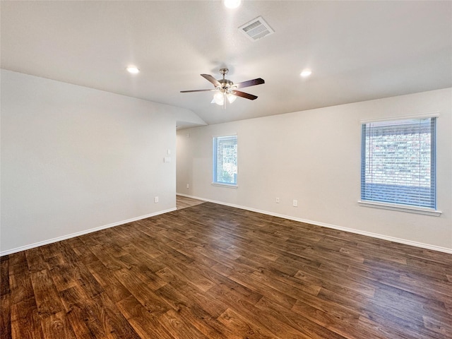 14127 Carly Pines Ct, Conroe, TX 77302 - empty room featuring dark wood-type flooring, a ceiling fan, recessed lighting, and vaulted ceiling