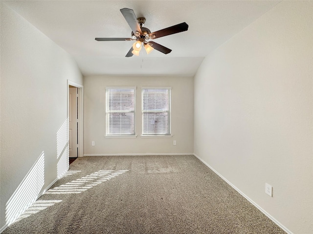 14127 Carly Pines Ct, Conroe, TX 77302 - spare room featuring carpet flooring, a ceiling fan, and lofted ceiling