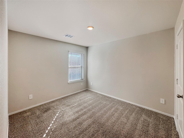 14127 Carly Pines Ct, Conroe, TX 77302 - carpeted spare room featuring baseboards
