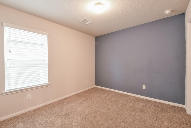 2233 Garden Square Path, Spring, TX 77386 - empty room with a smoke detector, carpet floors, and a textured ceiling