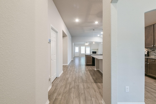 2233 Garden Square Path, Spring, TX 77386 - hallway featuring light wood finished floors, recessed lighting, and a textured wall