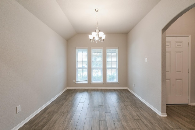 2233 Garden Square Path, Spring, TX 77386 - unfurnished room with arched walkways, dark wood finished floors, a chandelier, and lofted ceiling