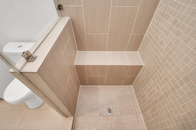 207 Pierce St Unit 301, Houston, TX 77002 - full bath with toilet and a tile shower