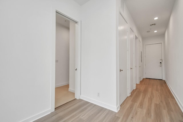 207 Pierce St Unit 301, Houston, TX 77002 - hall with light wood-style floors and recessed lighting