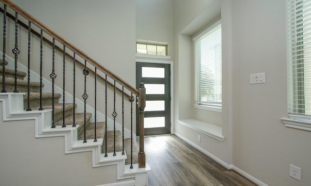 239 Biltmore Loop, Montgomery, TX 77316 - foyer featuring wood finished floors and stairs