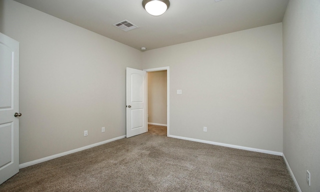 239 Biltmore Loop, Montgomery, TX 77316 - carpeted empty room featuring baseboards