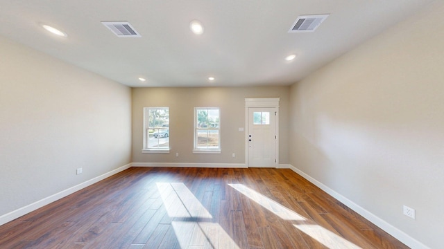 58 Lantana Ct, Lake Jackson, TX 77566 - foyer with dark wood finished floors and recessed lighting