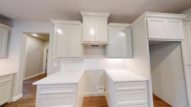 58 Lantana Ct, Lake Jackson, TX 77566 - kitchen featuring backsplash, light countertops, white cabinetry, and recessed lighting