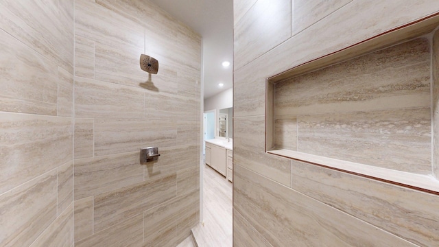 58 Lantana Ct, Lake Jackson, TX 77566 - full bath featuring a tile shower, vanity, and recessed lighting