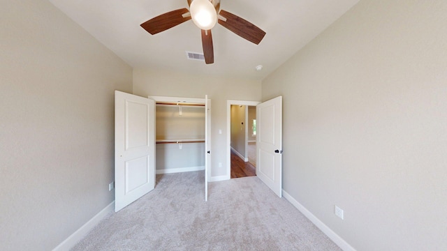 58 Lantana Ct, Lake Jackson, TX 77566 - unfurnished bedroom featuring carpet floors, a closet, and a ceiling fan