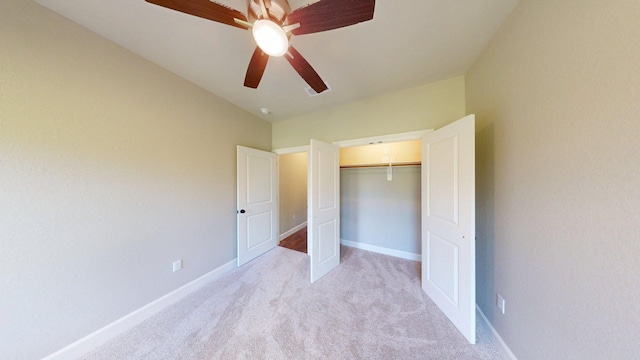 58 Lantana Ct, Lake Jackson, TX 77566 - unfurnished bedroom with light colored carpet, a closet, and a ceiling fan