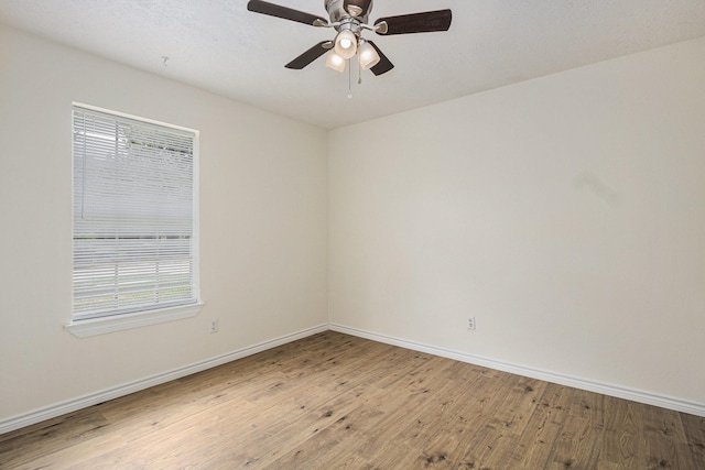 2612 Jeb Stuart Dr, League City, TX 77573 - unfurnished room with wood finished floors and a ceiling fan
