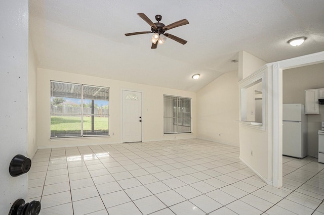 2612 Jeb Stuart Dr, League City, TX 77573 - entryway featuring lofted ceiling, light tile patterned floors, and a ceiling fan