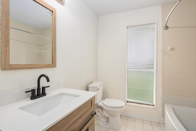 2612 Jeb Stuart Dr, League City, TX 77573 - bathroom with vanity, tile patterned floors, and a textured wall