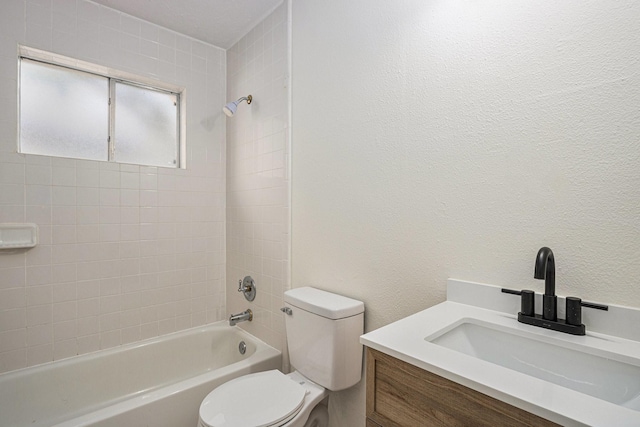 2612 Jeb Stuart Dr, League City, TX 77573 - full bathroom with washtub / shower combination, vanity, and a textured wall
