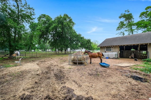 36602 Hondo Rd, Simonton, TX 77485 - view of yard featuring an exterior structure and an outbuilding